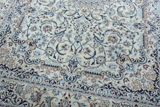 Close-up detail of 2000s Nain rug from Iran / Persia showing Wool weave