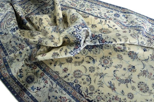 Surface texture of 2000s Nain rug with natural Cork and intricate pattern