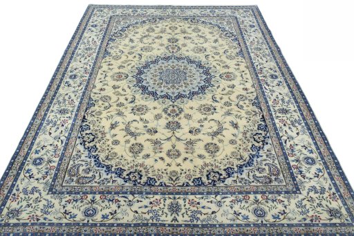 Surface texture of 2000s Nain rug with natural Cork and intricate pattern
