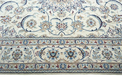 Corner detail of New Nain rug showing border pattern and Wool pile