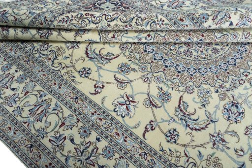 Close-up detail of 2000s Nain rug from Iran / Persia showing Wool weave