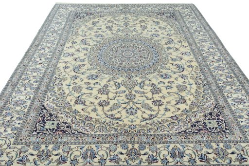 Surface texture of 2000s Nain rug with natural Wool and intricate pattern