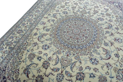 Backside of handmade 2000s Nain rug showing knot structure and weave density