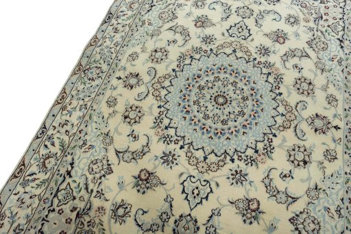 Backside of handmade 2000s Nain rug showing knot structure and weave density