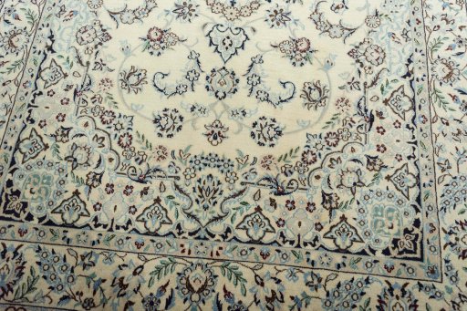 Close-up detail of 2000s Nain rug from Iran / Persia showing Wool weave