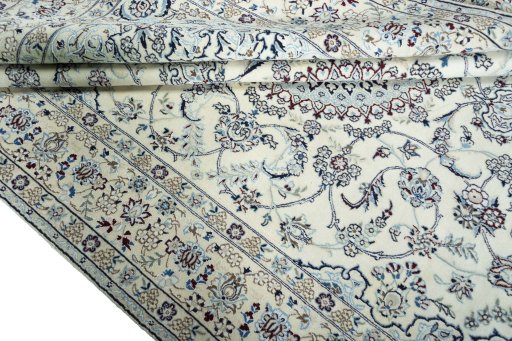 Close-up detail of 2000s Nain rug from Iran / Persia showing Wool weave