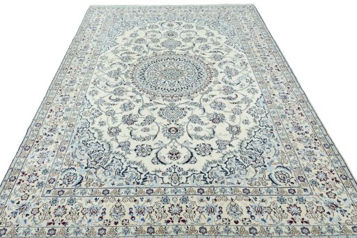 Surface texture of 2000s Nain rug with natural Wool and intricate pattern
