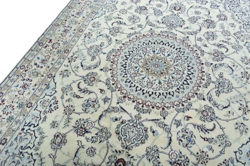 Backside of handmade 2000s Nain rug showing knot structure and weave density