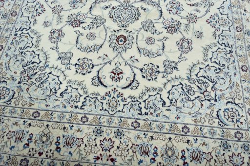 Close-up detail of 2000s Nain rug from Iran / Persia showing Wool weave