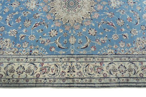Corner detail of 2000s Nain rug showing border pattern and Cork pile