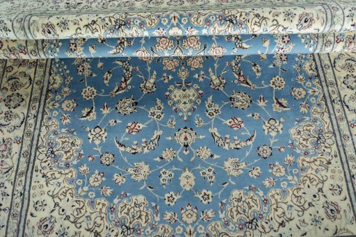Close-up detail of 2000s Nain rug from Iran / Persia showing Cork weave