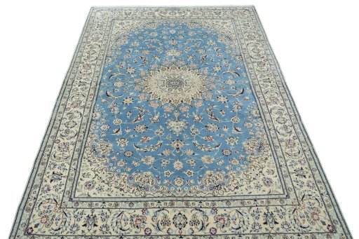 Surface texture of 2000s Nain rug with natural Cork and intricate pattern