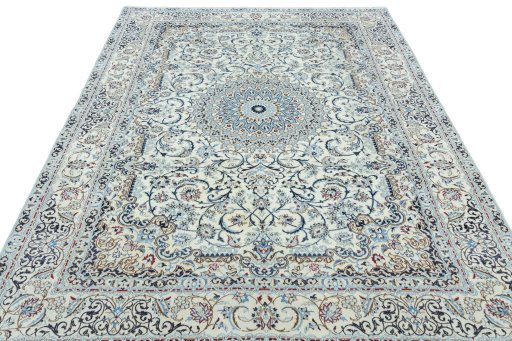 Surface texture of 2000s Nain rug with natural Wool and intricate pattern