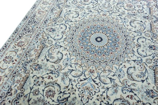 Backside of handmade 2000s Nain rug showing knot structure and weave density