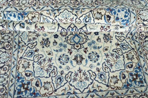 Close-up detail of 2000s Nain rug from Iran / Persia showing Wool weave