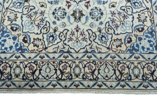 Full view of 2000s Nain rug from Iran / Persia, 206 × 127 cm in Beige tones