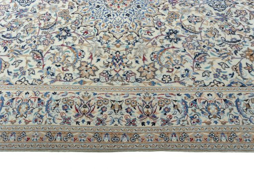 Corner detail of 2000s Nain rug showing border pattern and Wool pile