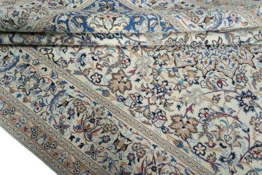 Close-up detail of 2000s Nain rug from Iran / Persia showing Wool weave