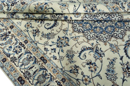Close-up detail of 2000s Nain rug from Iran / Persia showing Wool weave