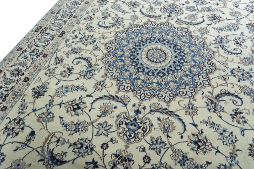Backside of handmade 2000s Nain rug showing knot structure and weave density