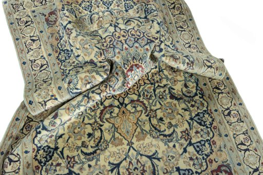 Surface texture of 2000s Nain rug with natural Wool and intricate pattern
