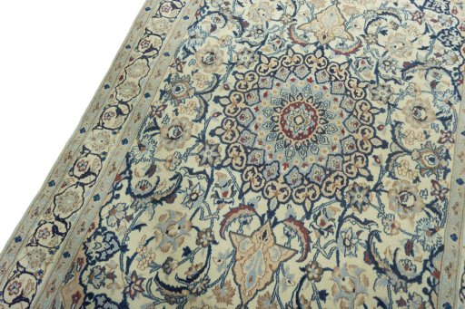 Backside of handmade 2000s Nain rug showing knot structure and weave density