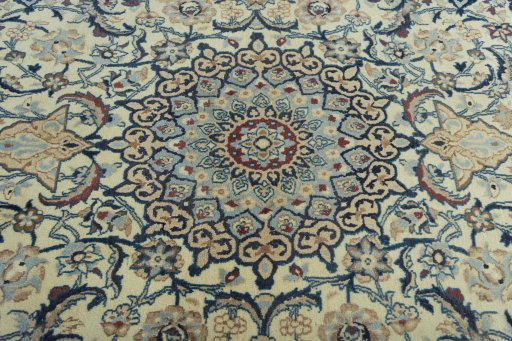 Central medallion detail of 2000s Nain rug from Iran / Persia