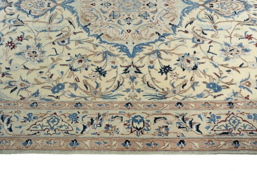 Corner detail of 2000s Nain rug showing border pattern and Wool pile