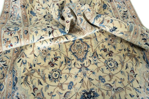 Surface texture of 2000s Nain rug with natural Wool and intricate pattern