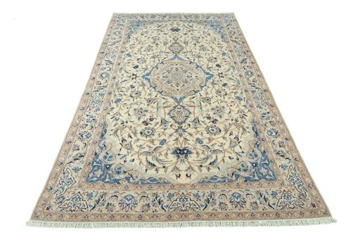 Surface texture of 2000s Nain rug with natural Wool and intricate pattern