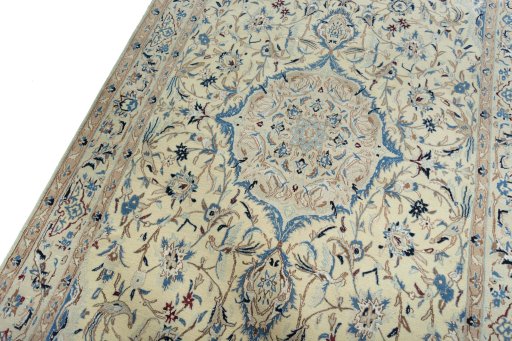 Backside of handmade 2000s Nain rug showing knot structure and weave density