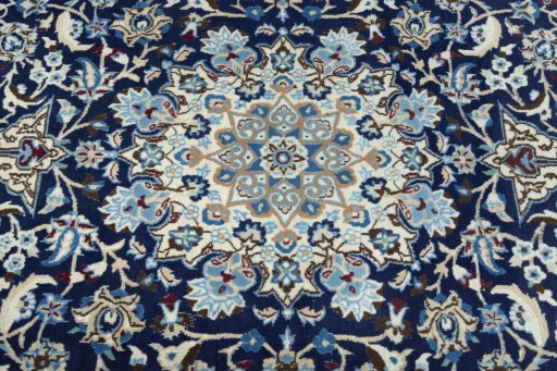 Central medallion detail of 2000s Nain rug from Iran / Persia