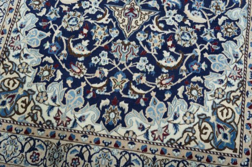 Close-up detail of 2000s Nain rug from Iran / Persia showing Wool weave