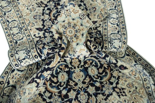 Close-up detail of 2000s Nain rug from Iran / Persia showing Wool weave