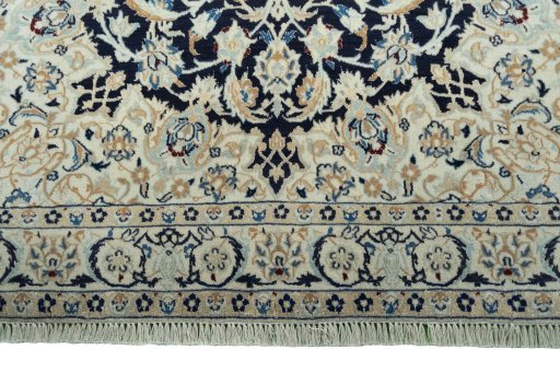 Close-up detail of 2000s Nain rug from Iran / Persia showing Wool weave