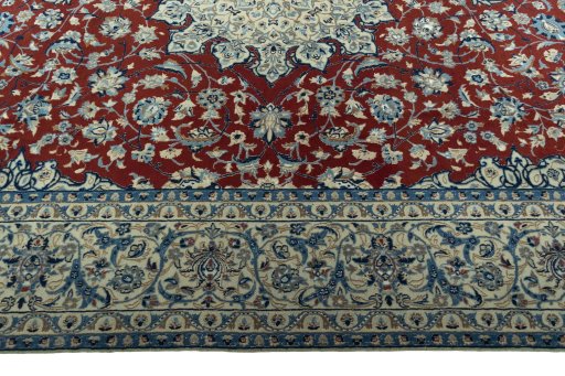 Corner detail of 2000s Nain rug showing border pattern and Wool pile