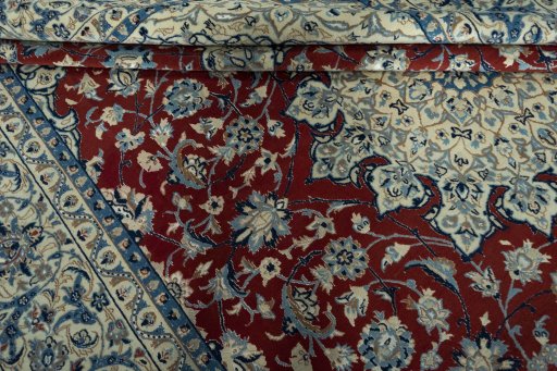 Close-up detail of 2000s Nain rug from Iran / Persia showing Wool weave
