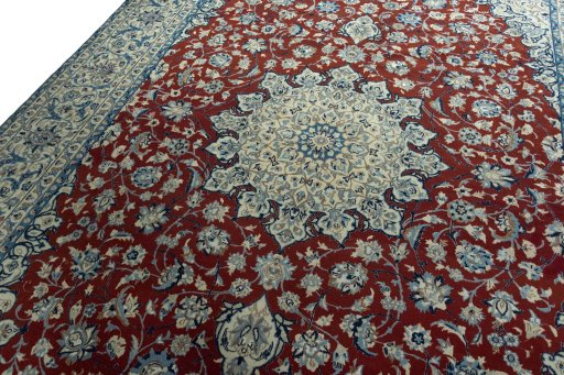 Backside of handmade 2000s Nain rug showing knot structure and weave density