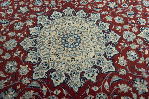 Central medallion detail of 2000s Nain rug from Iran / Persia