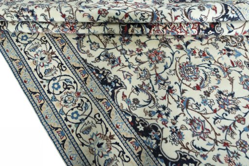 Close-up detail of 2000s Nain rug from Iran / Persia showing Wool weave