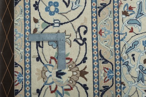Backside of handmade 2000s Nain rug showing knot structure and weave density