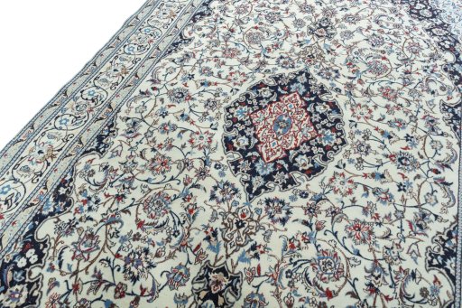 Backside of handmade 2000s Nain rug showing knot structure and weave density