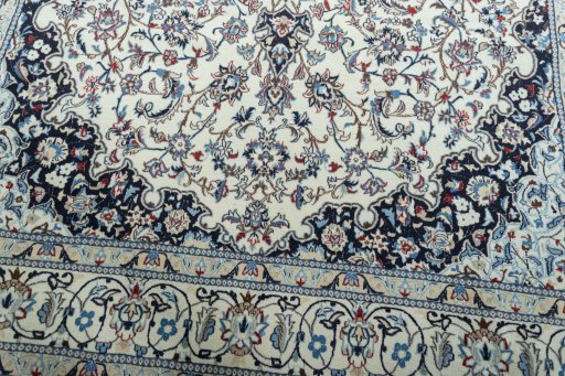 Close-up detail of 2000s Nain rug from Iran / Persia showing Wool weave