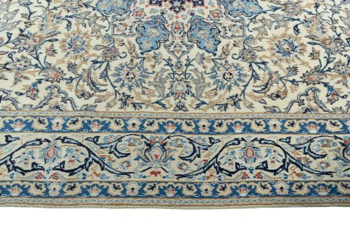 Corner detail of 2000s Nain rug showing border pattern and Wool pile