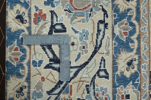 Backside of handmade 2000s Nain rug showing knot structure and weave density