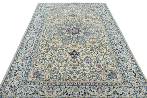 Surface texture of 2000s Nain rug with natural Wool and intricate pattern