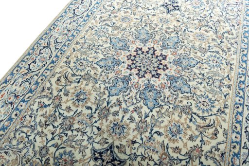 Backside of handmade 2000s Nain rug showing knot structure and weave density