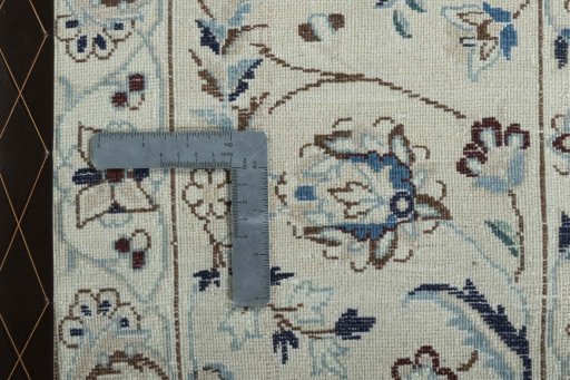 Backside of handmade 2000s Nain rug showing knot structure and weave density