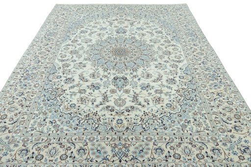 Surface texture of 2000s Nain rug with natural Wool and intricate pattern
