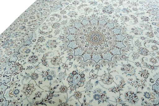 Backside of handmade 2000s Nain rug showing knot structure and weave density